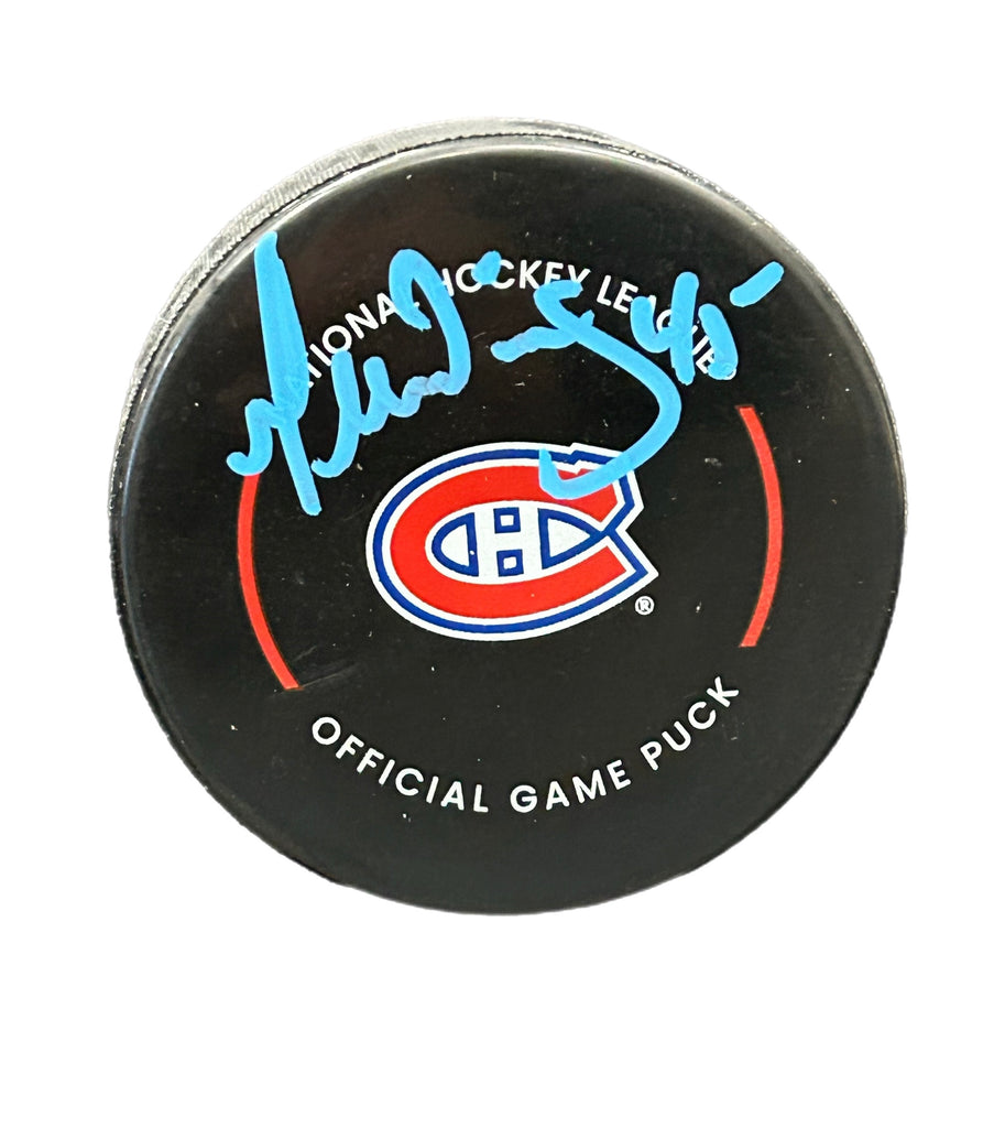 Gilbert Dionne Autographed Puck - Official