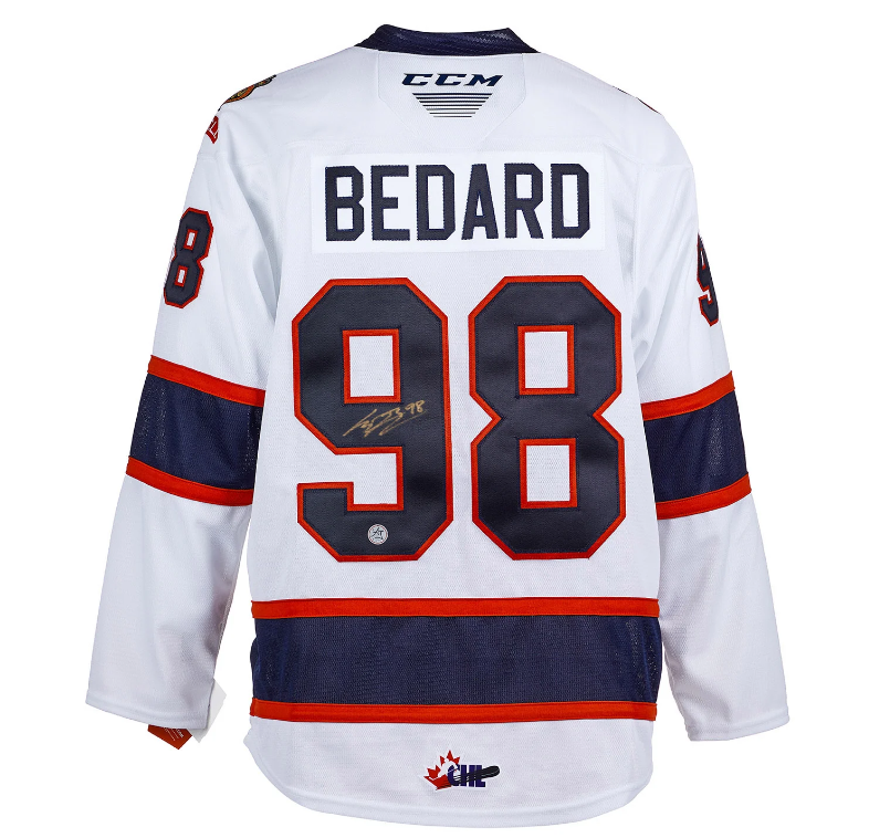 (PAST AUCTION) <br> LOT 10: CONNOR BEDARD AUTOGRAPHED WHITE REGINA PATS CCM JERSEY