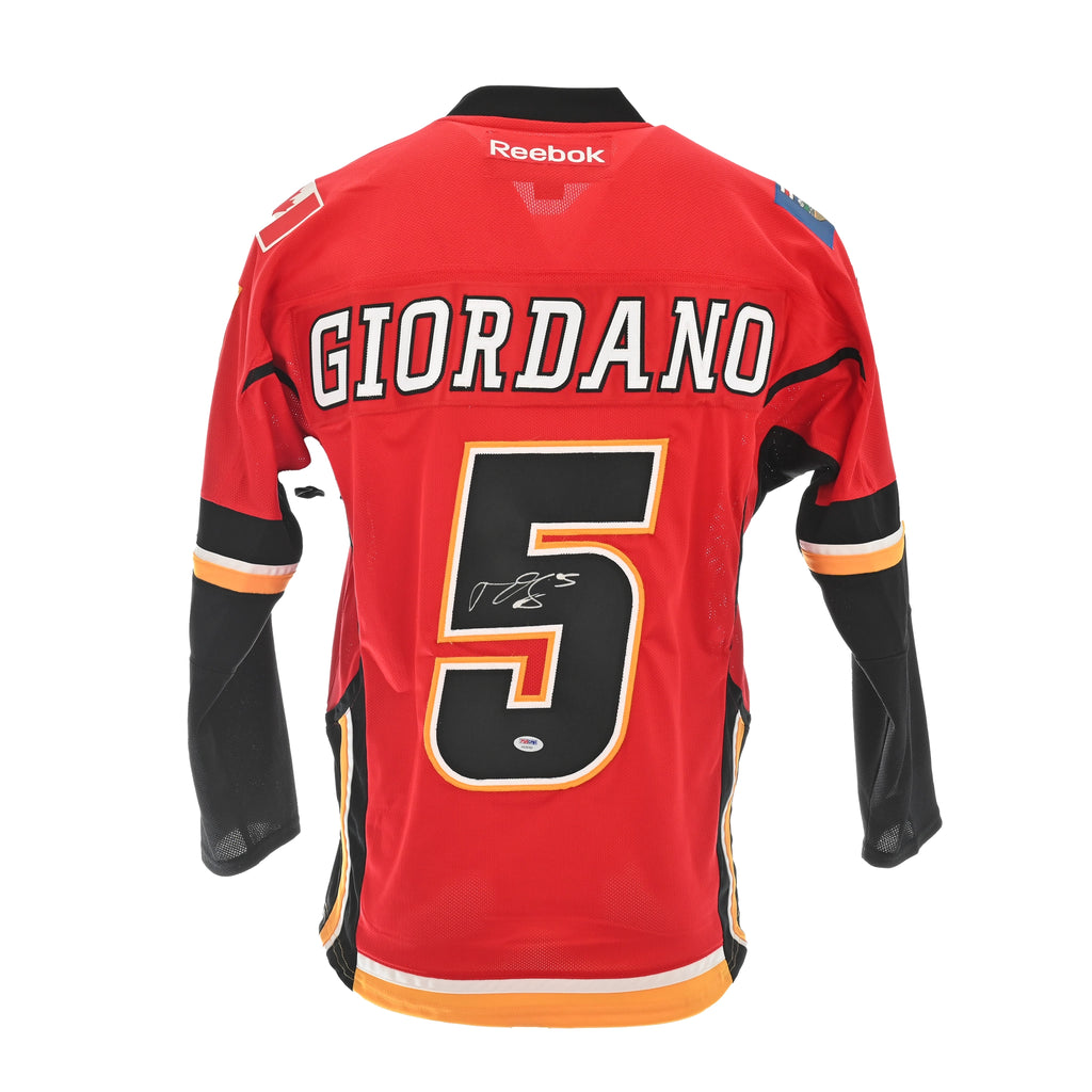 LOT 43: LOT OF 2 AUTOGRAPHED JERSEYS MARK GIORDANO AND ERIK KARLSSON