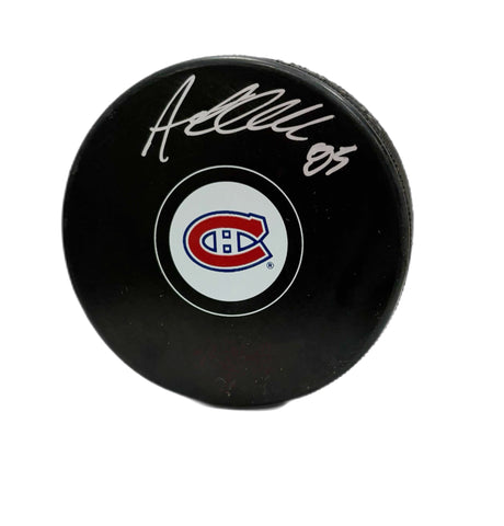 Alexandre Texier Autographed Puck - Logo