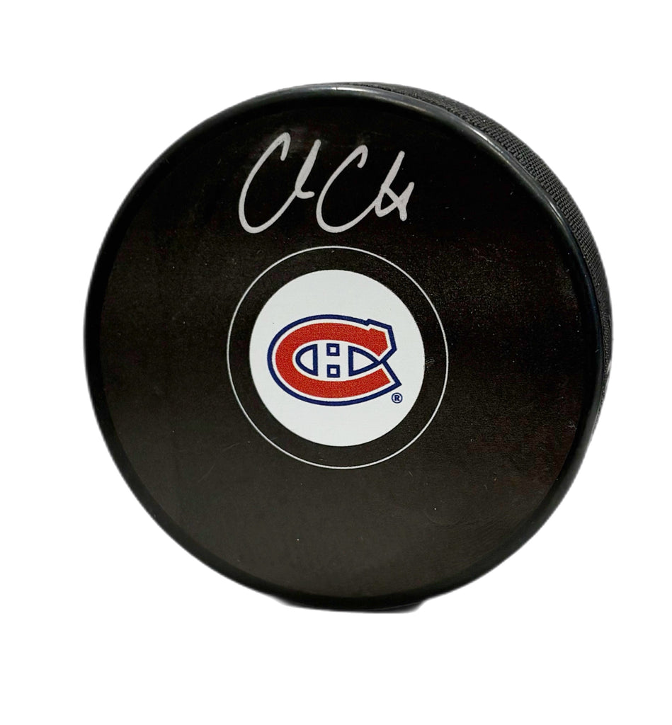 Cole Caufield Autographed Puck - Logo