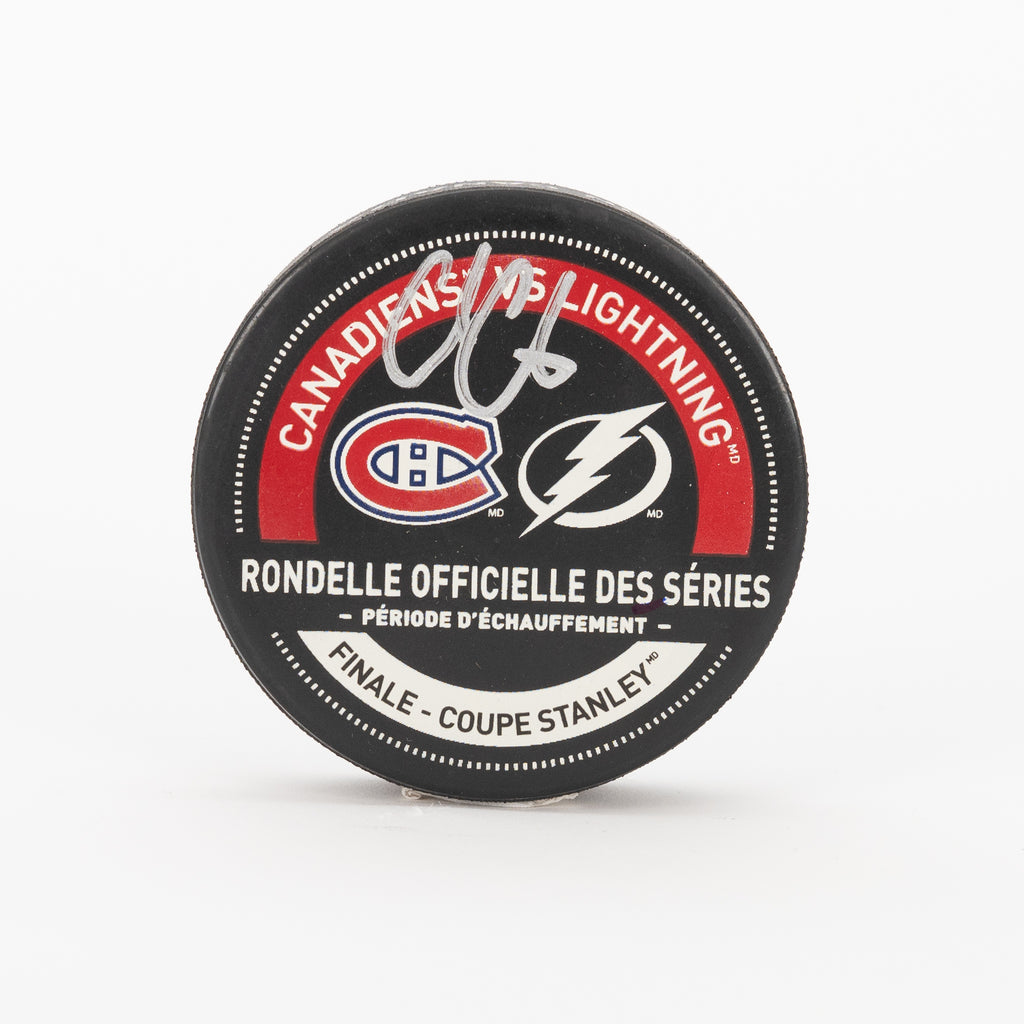 (PAST AUCTION) <br> Lot 30: Cole Caufield Autographed Warm Up Puck vs Tampa Bay Lightning