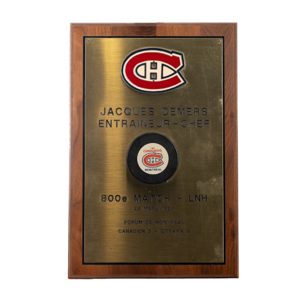 (PAST AUCTION) <br> LOT 16: JACQUES DEMERS AUTOGRAPHED 800TH NHL GAME PUCK WITH PLAQUE