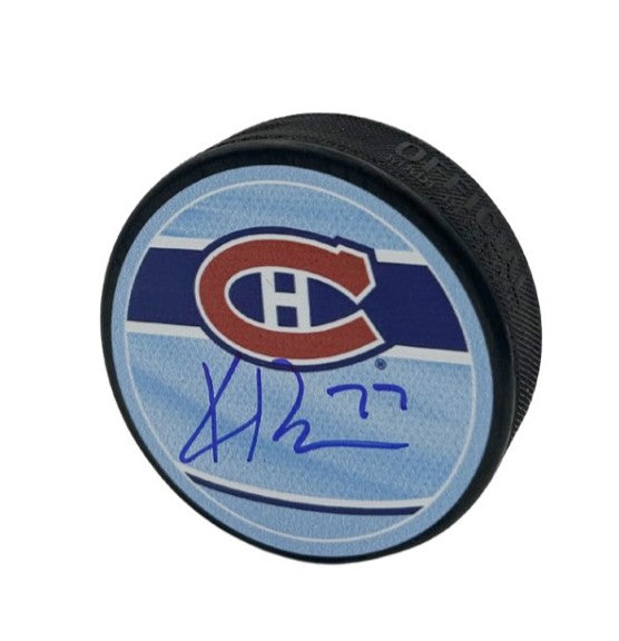 Kirby Dach Autographed Puck - Reverse Retro