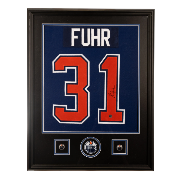 (PAST AUCTION) <br> LOT 44: GRANT FUHR AUTOGRAPHED FRAMED CCM JERSEY