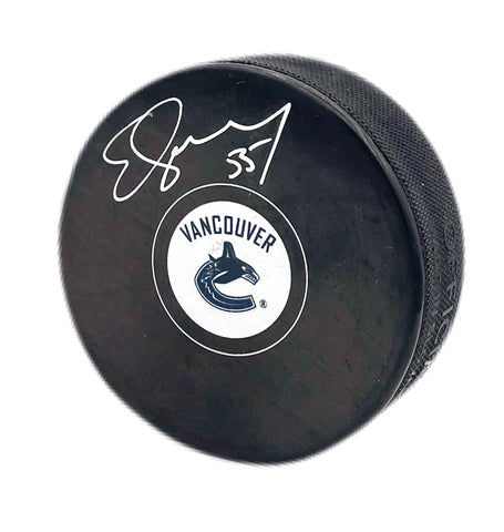 Ed Jovanovski Autographed Puck - Logo Vancouver