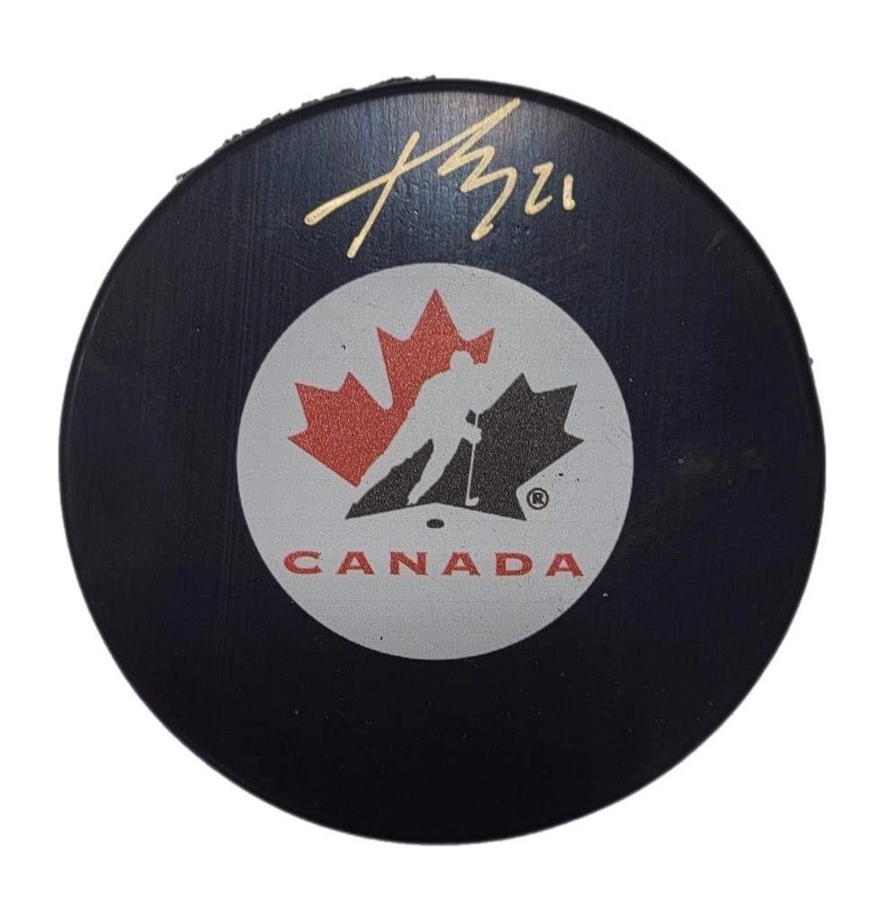 Kaiden Guhle Autographed Puck - Team Canada